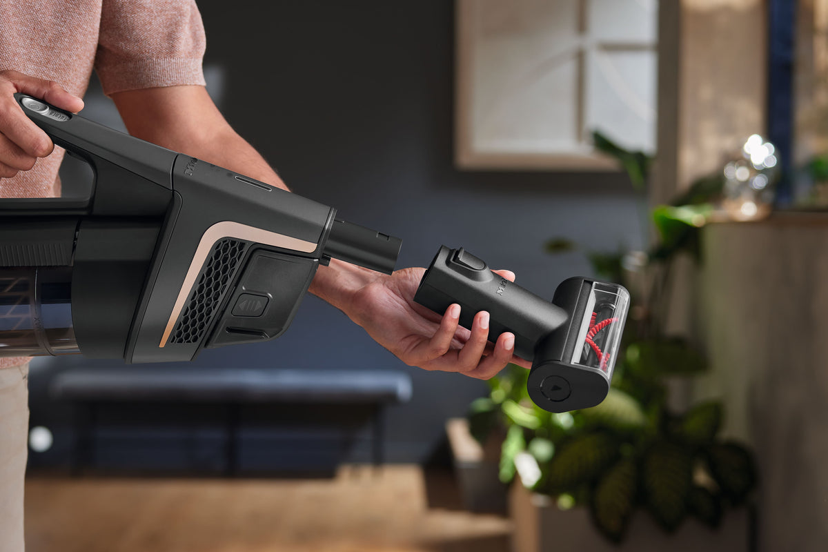 Miele HX-EC 10 Compact Handheld Brush — brush connected to a cordless vacuum