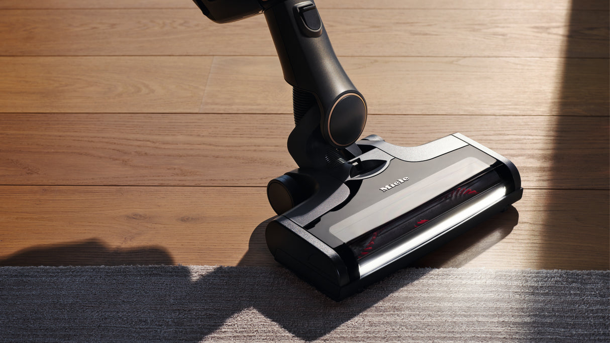 Miele Triflex HX2 Pro Infinity Grey — stairs cleaning lifestyle