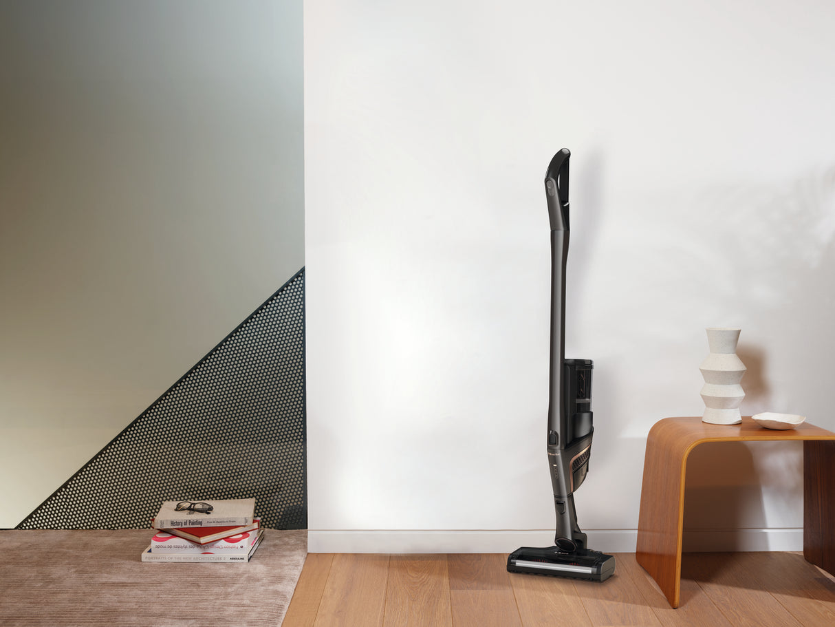 Miele Triflex HX2 Pro Infinity Grey — living room cleaning lifestyle