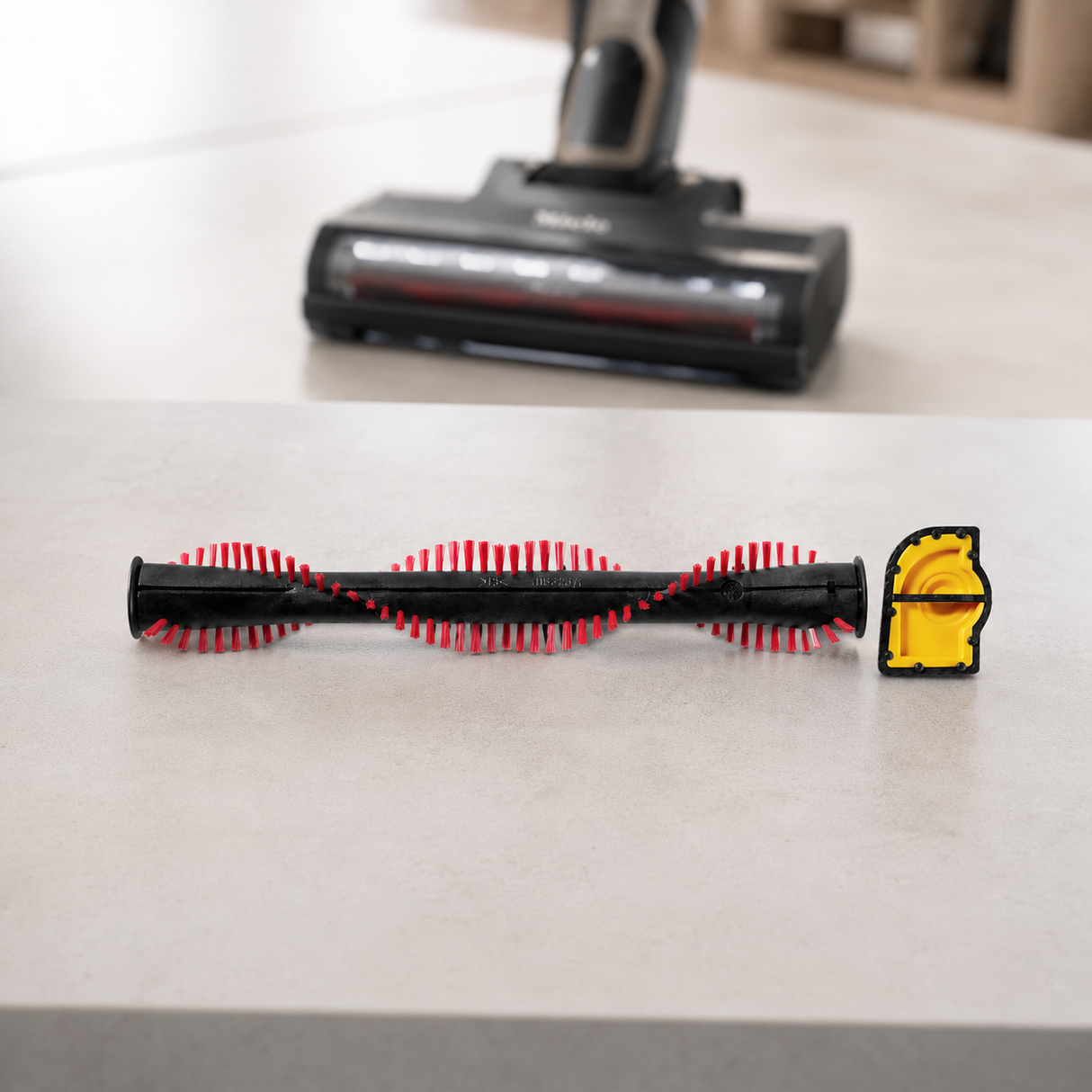 Genuine Miele Roller Brush Handle for Triflex HX1 shown in a realistic home or maintenance setting