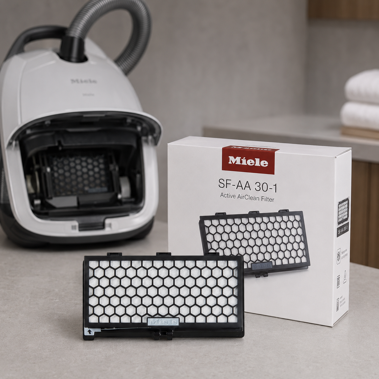 Genuine Miele SF-AA 30-1 Active AirClean Charcoal Filter shown in a realistic home or maintenance setting