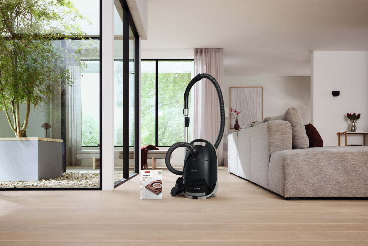 Miele HyClean Air CO FilterBags 4-pack lifestyle with Guard M1 vacuum