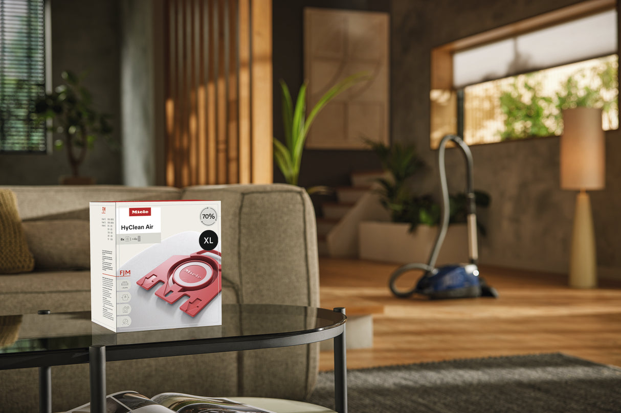 Miele HyClean Air FJM XL Pack lifestyle with Compact C1 vacuum