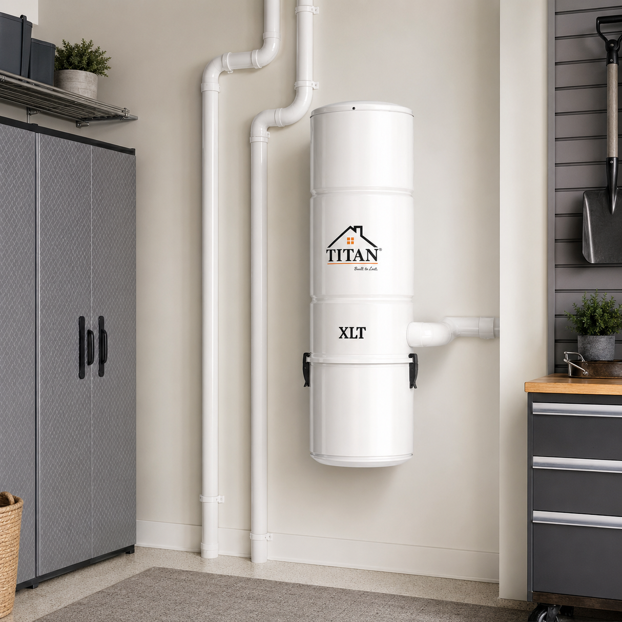 Titan TCS-9902 central vacuum power unit installed in a clean garage