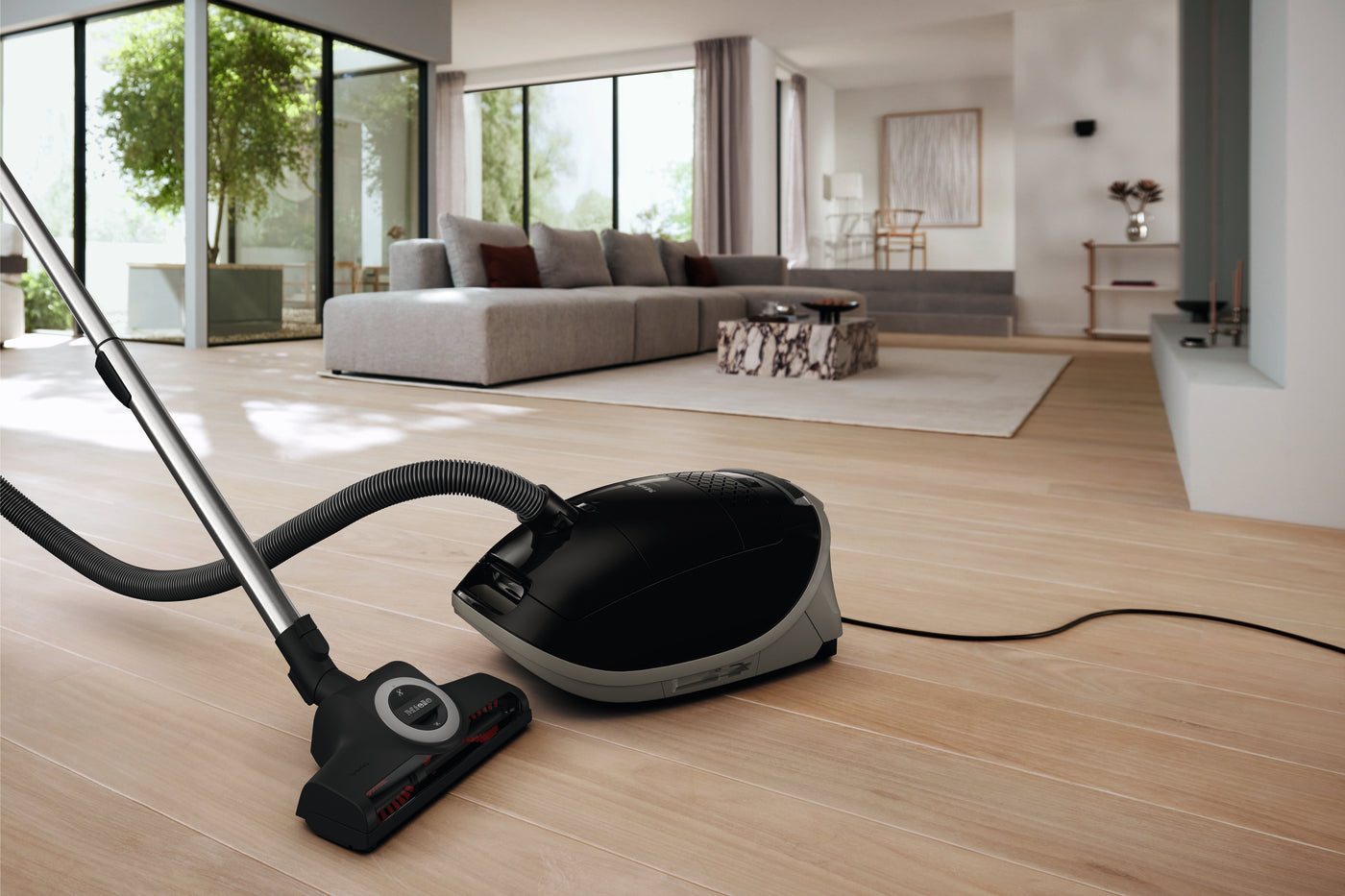 Miele Guard sealed-system canister vacuum cleaning a home for allergy and asthma relief at Avon Vacuums in Avon CT