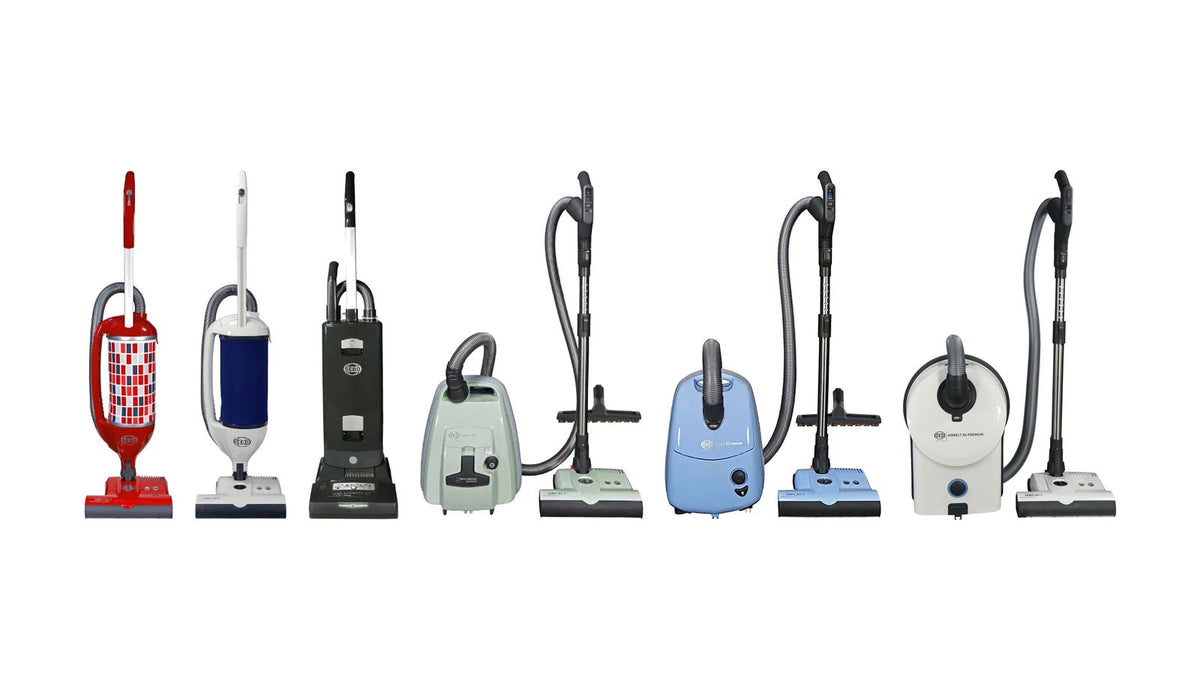 SEBO lineup: FELIX Premium in Rosso, DART, AUTOMATIC X7 Premium in Graphite, AIRBELT K3 Premium in Pastel Mint, AIRBELT E3 Premium in Pastel Blue and AIRBELT D4 Premium in White