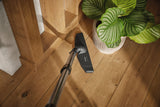 Genuine Miele Parquet Twister XL parquet brush | 7101160 — shown cleaning around furniture