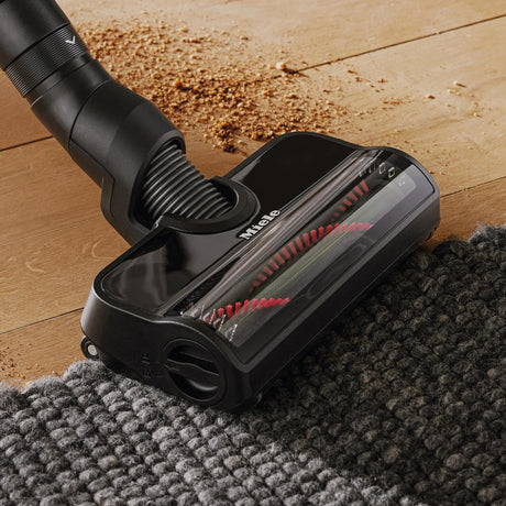 Miele Duoflex HX1 cleaning hard flooring with MultiFloor electrobrush in a Connecticut home setting