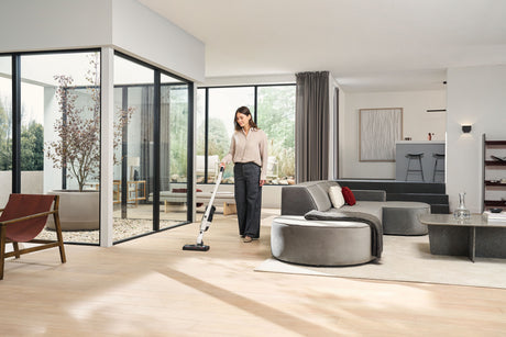 Miele Triflex HX3 — vacuuming a living room floor