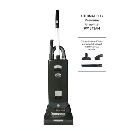 Black vacuum cleaner with attachments on a white background