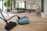 Miele Guard L1 Electro Nordic Blue — lifestyle in-home cleaning scene