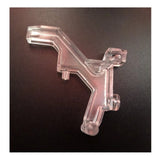 Clear plastic Miele SEB236 interlock with an angled arm and mounting features on a dark surface