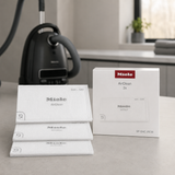 Genuine Miele SF-SAC 20/30 AirClean Filter | 3-Pack shown in a realistic home or maintenance setting