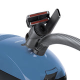 Miele Classic C1 Turbo Team PowerLine accessories – upholstery nozzle, crevice tool, and dust brush attached