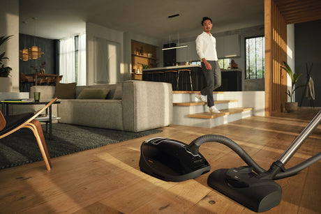 Miele Complete C3 Kona PowerLine Canister Vacuum cleaning hardwood floor – Obsidian Black