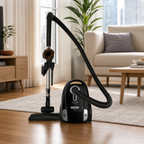 Titan T1400 compact canister vacuum in a bright condo