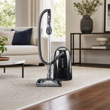 Titan T9500 premium canister vacuum on plush carpet