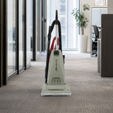 Titan TC6000.2 commercial upright vacuum in an office corridor