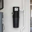 Titan TCS-5525 central vacuum installed in a residential utility room